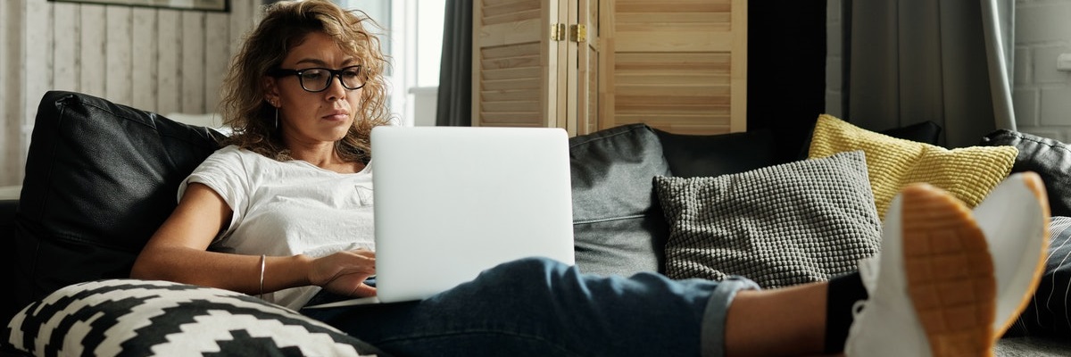 woman using her laptop at home